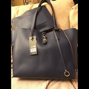New with tags Travanti large navy purse.